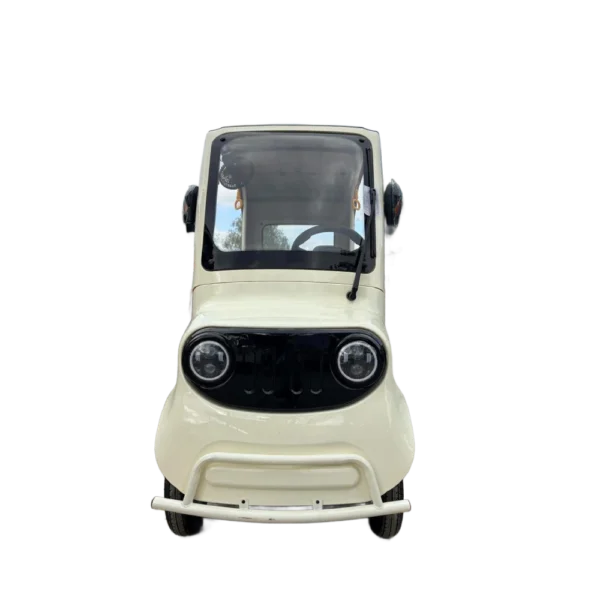 Front view of beige electric tricycle with enclosed body and round headlight design