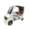 Beige electric passenger tricycle with enclosed cabin and compact modern design