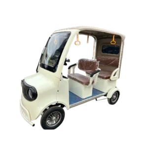 Beige electric passenger tricycle with enclosed cabin and compact modern design