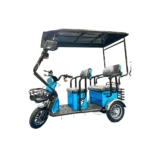 Angled view of electric passenger tricycle with open frame and passenger capacity