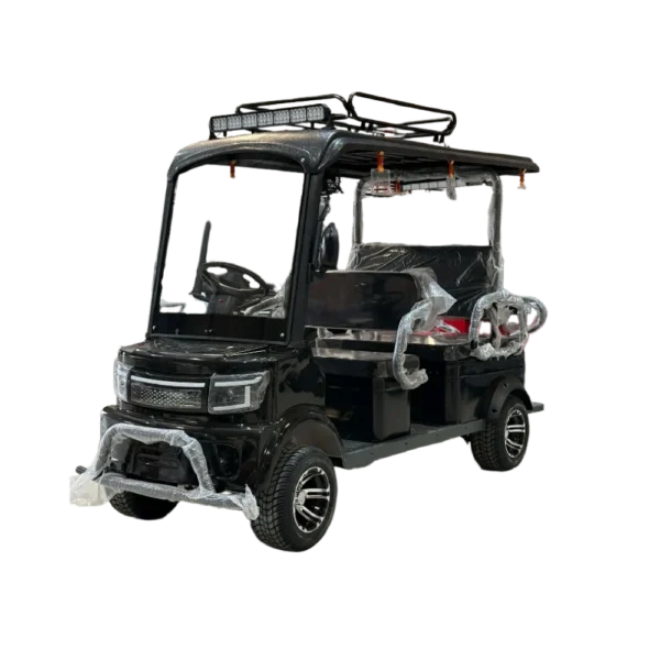 Black electric passenger tricycle with elevated roof and compact transport design