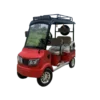 Red electric passenger tricycle with front windshield and elevated canopy roof
