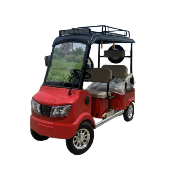 Red electric passenger tricycle with front windshield and elevated canopy roof