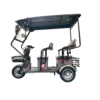 Gray electric tricycle with extended roof and multi-passenger seating design