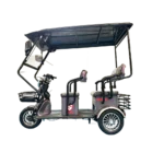 Gray electric tricycle with extended roof and multi-passenger seating design
