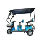 Blue electric passenger tricycle with open seating configuration and roof canopy