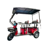 Red electric passenger tricycle with extended canopy and multi-seat passenger layout