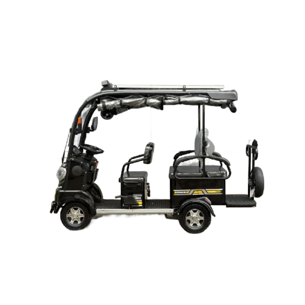 Side profile of solar electric tricycle with open frame and roof mounted solar panel
