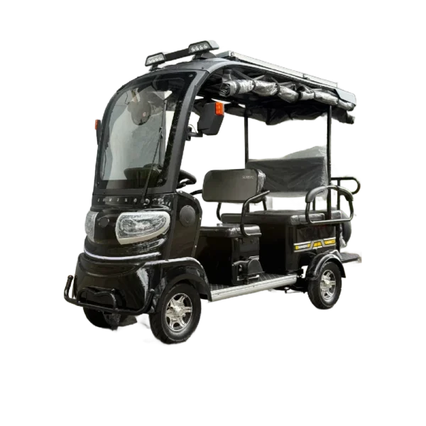 Black solar electric passenger tricycle with enclosed cabin and solar roof panel