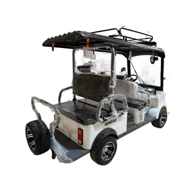 Rear angled view of 6-seater white electric passenger tricycle with roof rack and spare tire