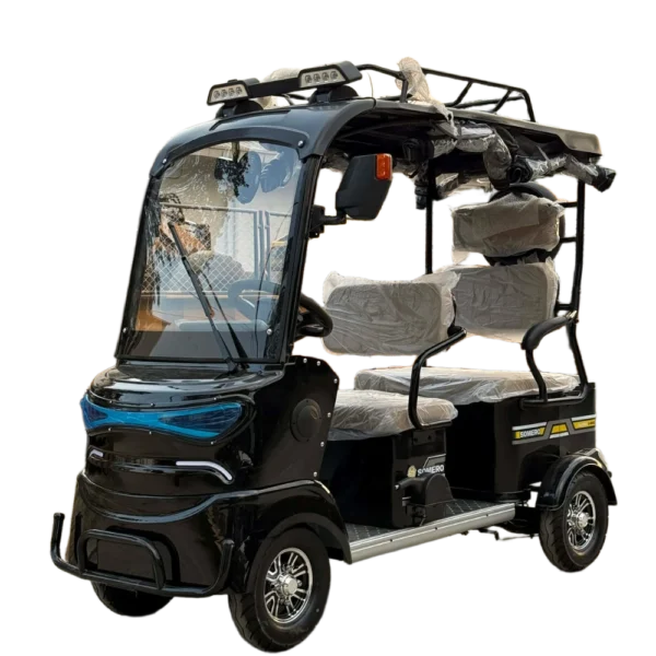 Front angled view of electric tricycle with windshield and enclosed cabin design