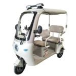 Beige electric passenger tricycle with roof and comfortable seating for urban transport