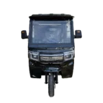 Front view of electric tricycle with windshield and compact urban design
