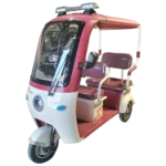 Red electric passenger tricycle with roof and multi-passenger seating for transport