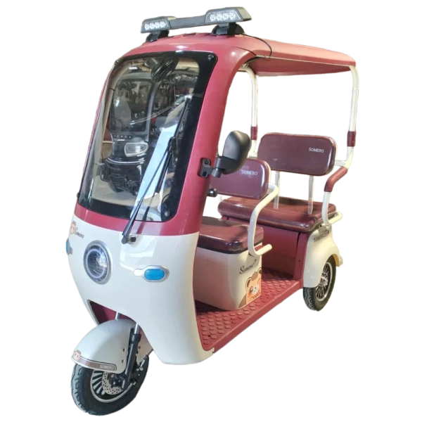 Red electric passenger tricycle with roof and multi-passenger seating for transport