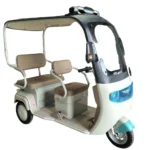 Side view of electric passenger tricycle showing seating and design