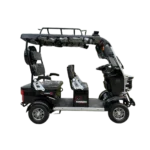 Left side view of black electric tricycle with rear passenger seating and open frame layout