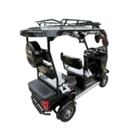 Rear angled view of black electric passenger tricycle showing seating area and roof structure