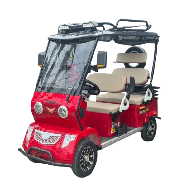 Red electric passenger tricycle with enclosed front cabin and roof for weather protection