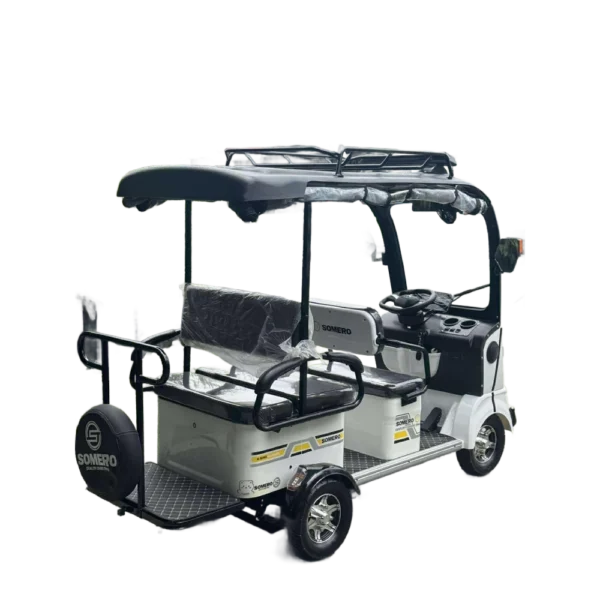 Angled rear view of white solar electric tricycle with cargo rack and solar roof