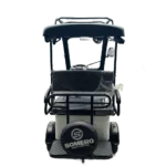 Rear view of white solar electric tricycle with passenger seating and roof mounted solar panel