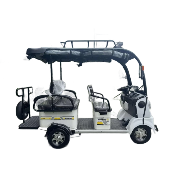 Left side view of solar powered electric tricycle with open frame and passenger seats