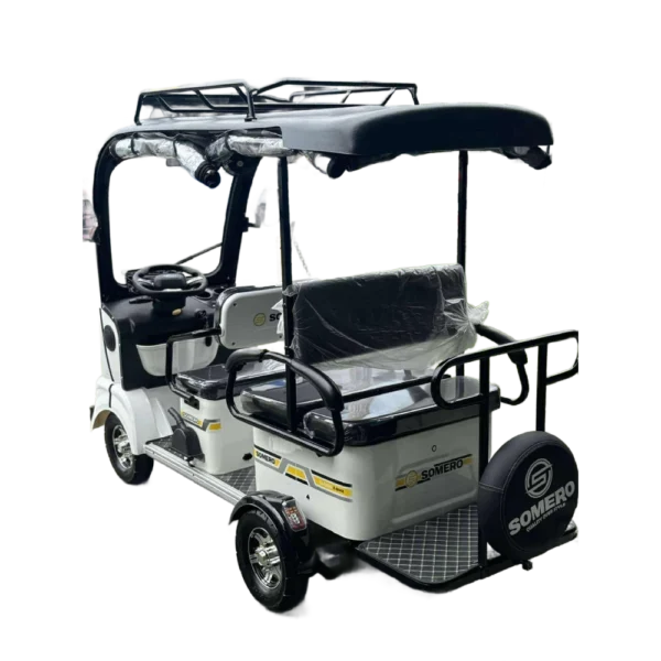 Angled rear view of white solar electric tricycle with cargo rack and solar roof