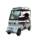 White electric passenger tricycle with windshield and roof designed for city transport in the Philippines