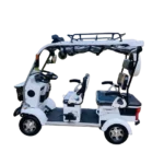 Side view of white four-wheel electric tricycle with spacious seating and canopy roof