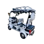 Rear view of white electric passenger tricycle with spare tire and passenger configuration