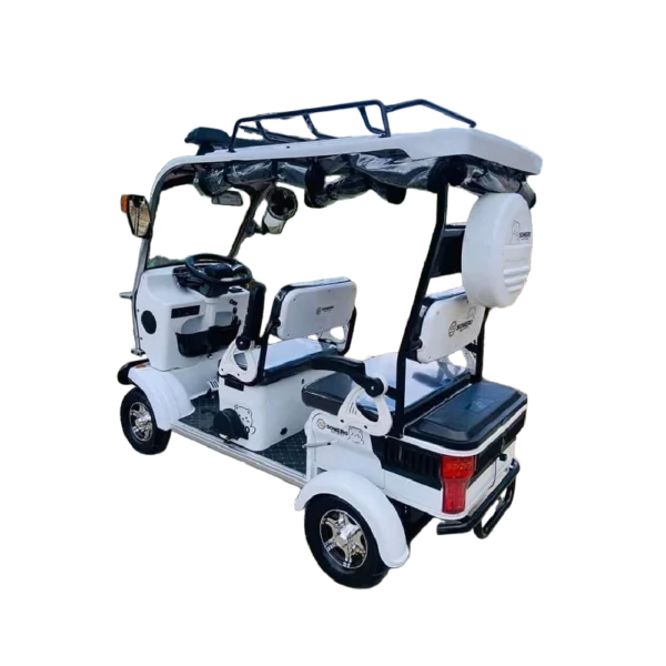 Rear view of white electric passenger tricycle with spare tire and passenger configuration