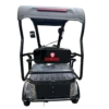 Rear view of electric passenger tricycle with roof showing passenger seating and back design