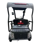Rear view of electric passenger tricycle with roof showing passenger seating and back design