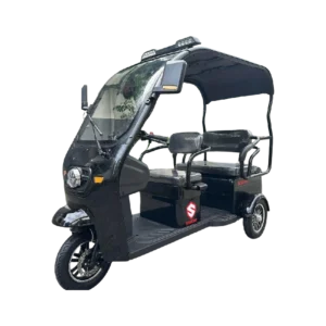 Angled view of electric passenger tricycle with roof and rear seating for transport