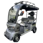 Angled view of gray electric passenger tricycle with roof and enclosed cabin design