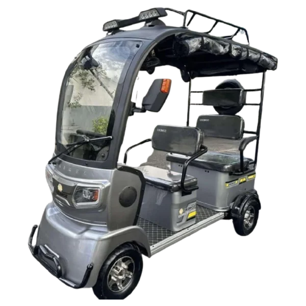 Angled view of gray electric passenger tricycle with roof and enclosed cabin design