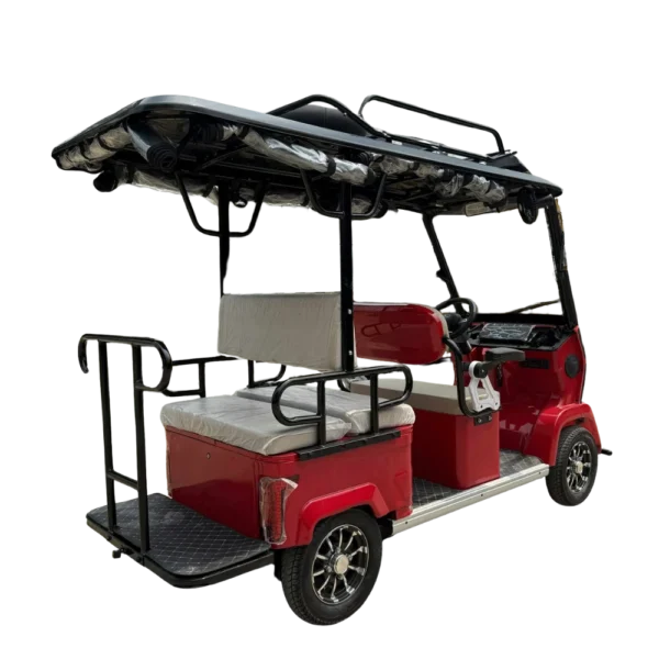 Angled side view of red electric passenger tricycle with canopy and multi-passenger seating in the Philippines
